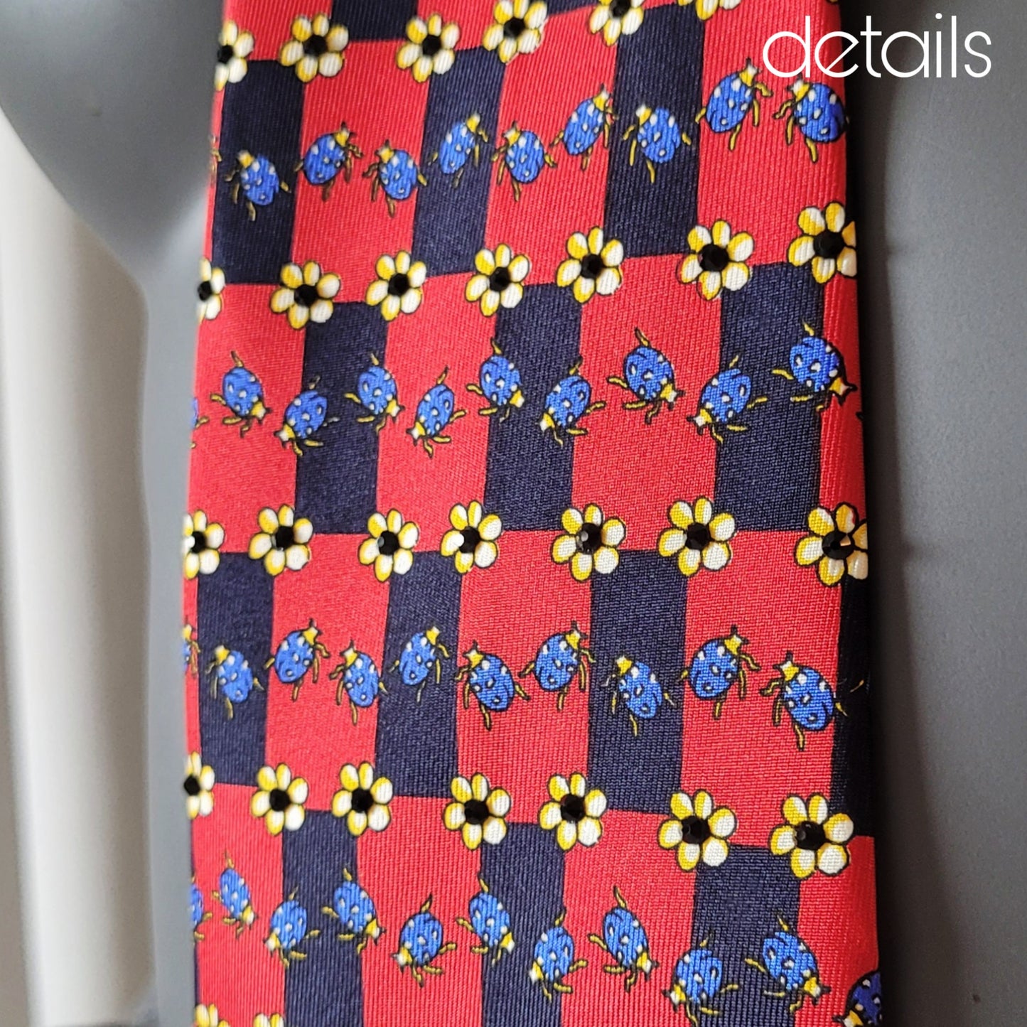 Another Dance collection: Bugs tie, vintage checked black and red silk necktie with printed blue ladybugs and yellow flowers adorned with black glass crystals