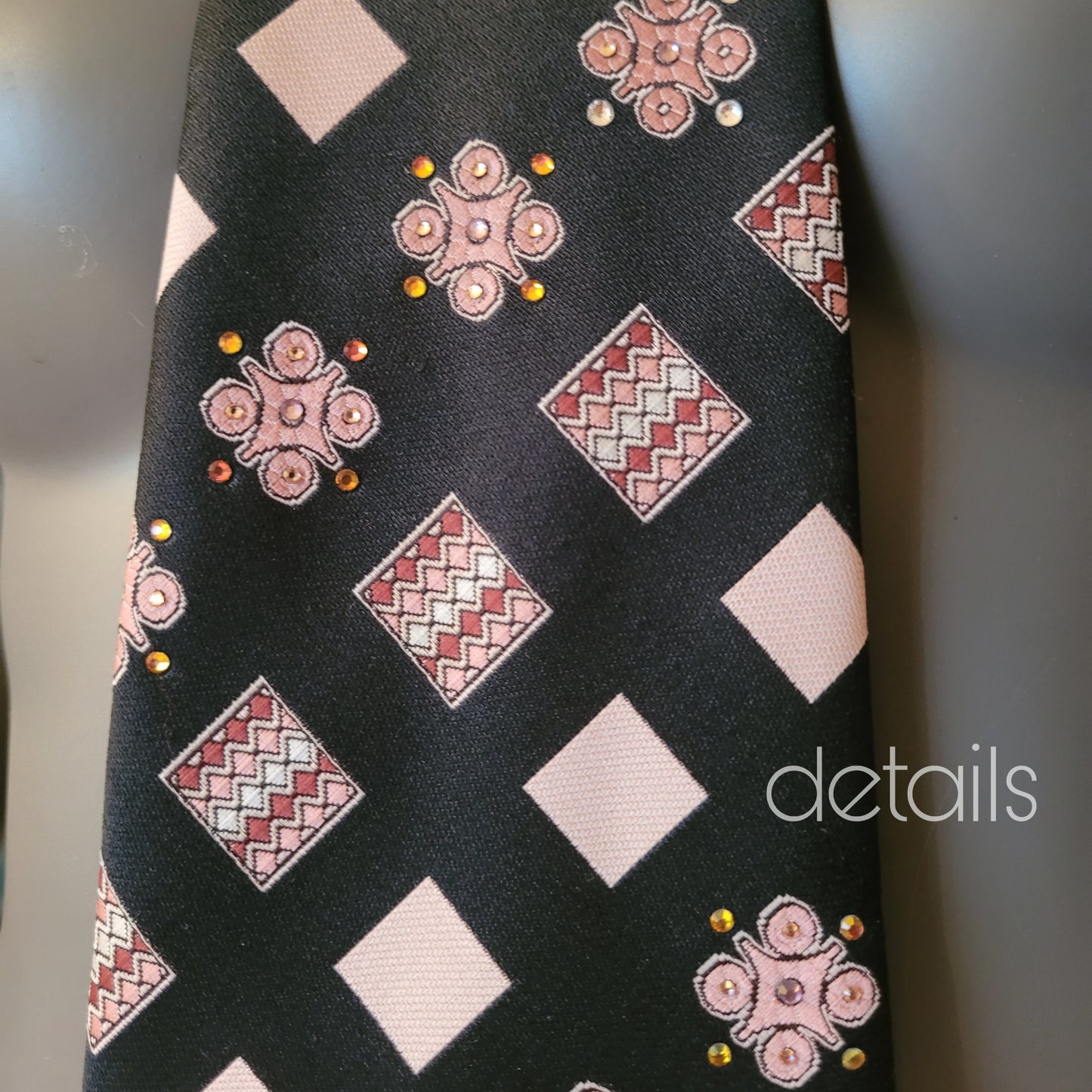 Another Dance collection: Fields of Heaven tie, original 70's retro black polyester necktie with square, wave, and flower pattern in pink and burgundy, adorned with shimmering glass crystals in matching shades