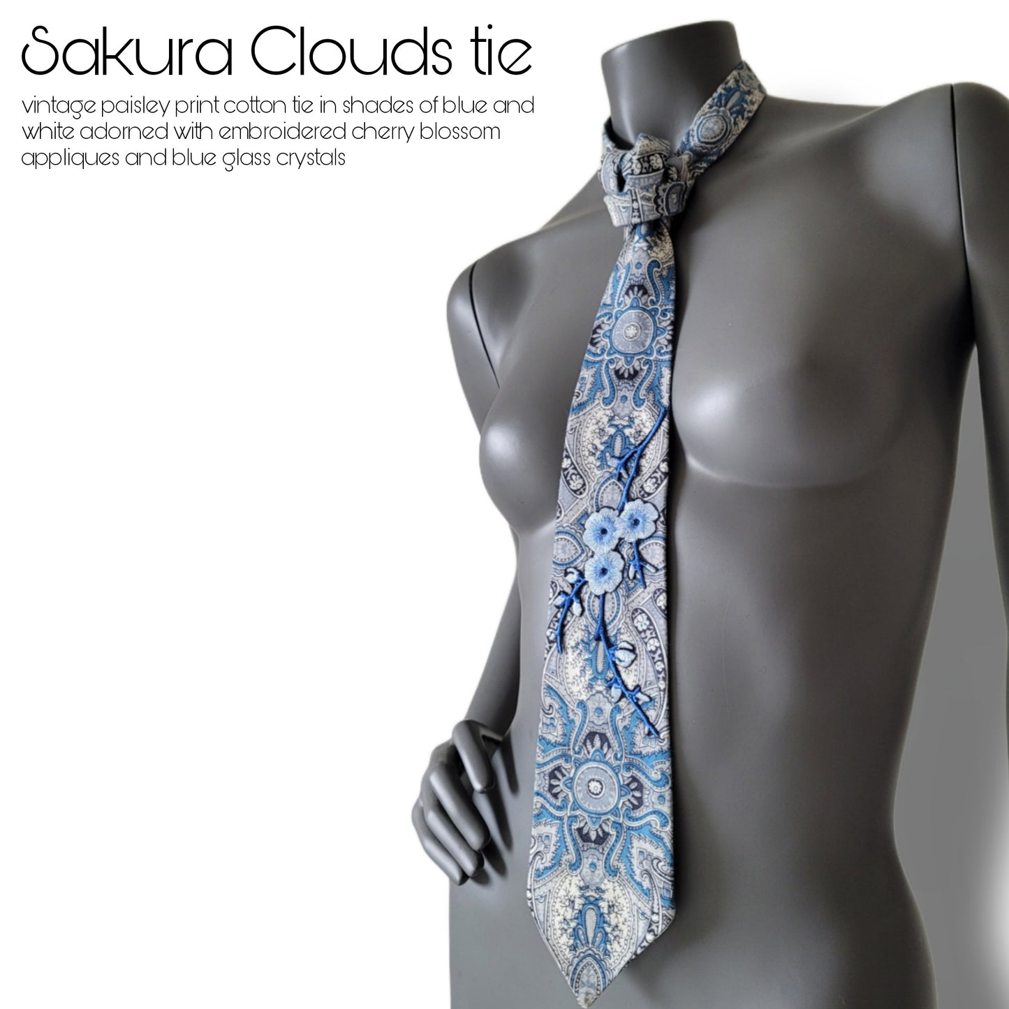 Sakura Blues collection: Sakura Clouds tie, cotton paisley patterned necktie in shades of blue and white adorned with embroidered cherry blossom appliques and blue glass crystals