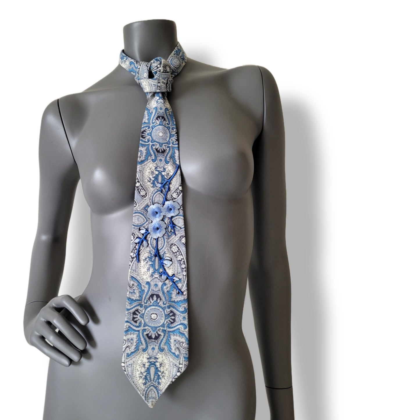 Sakura Blues collection: Sakura Clouds tie, cotton paisley patterned necktie in shades of blue and white adorned with embroidered cherry blossom appliques and blue glass crystals