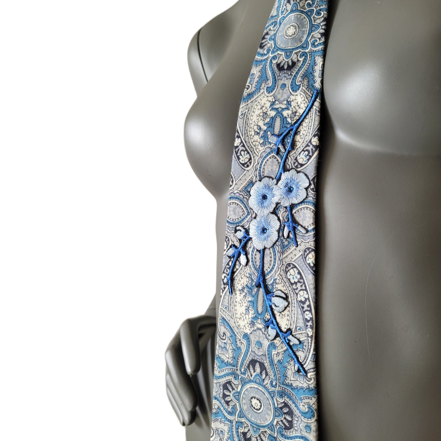 Sakura Blues collection: Sakura Clouds tie, cotton paisley patterned necktie in shades of blue and white adorned with embroidered cherry blossom appliques and blue glass crystals