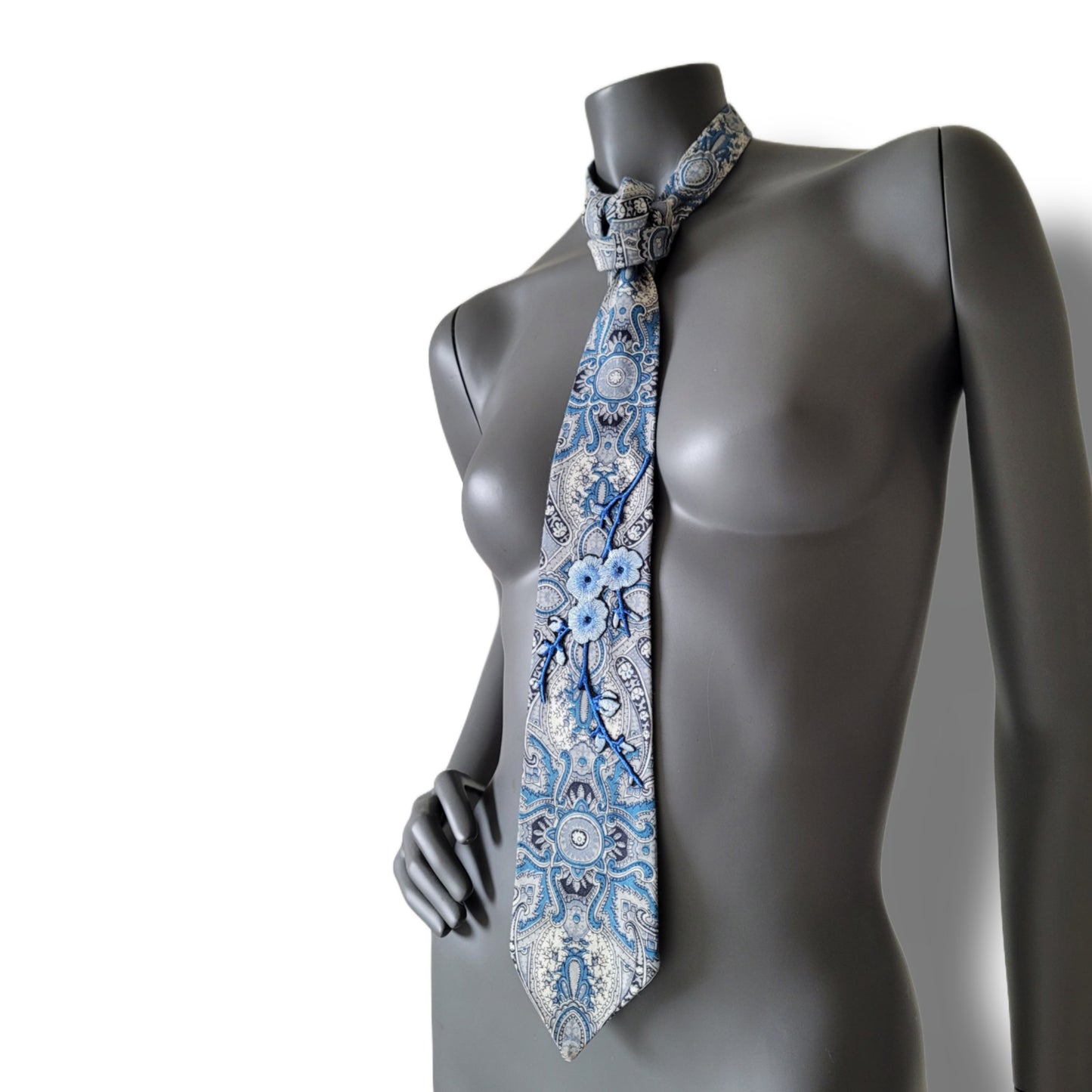 Sakura Blues collection: Sakura Clouds tie, cotton paisley patterned necktie in shades of blue and white adorned with embroidered cherry blossom appliques and blue glass crystals