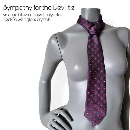 Another Dance collection: Sympathy for the Devil tie, retro marine blue and red polyester necktie with medallion pattern adorned with glass crystals shifting in red and blue